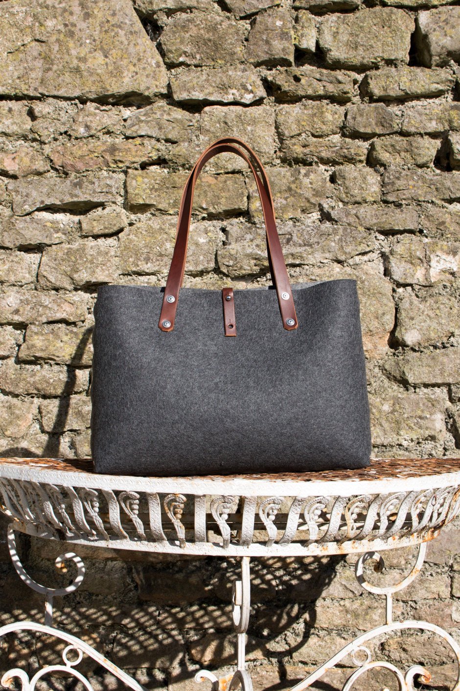 grey felt handbag