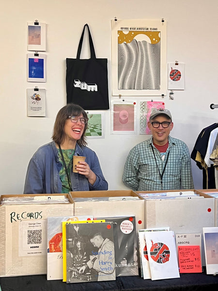 Angi and George tabling at Acid-Free Los Angeles Art Book Fair 2023. Photo Credit Emory Davis