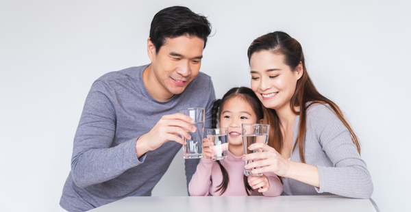 A family enjoys filtered water together