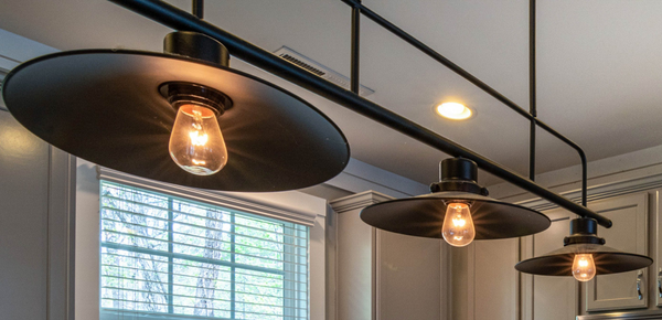 A line of modern energy-efficient ceiling lights in a kitchen