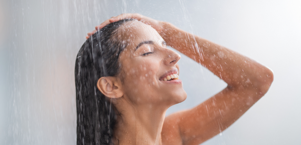 A woman enjoying a shower