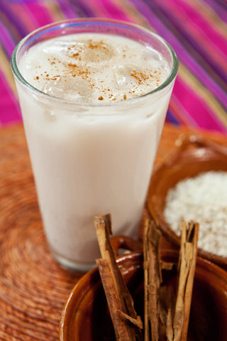 Glass of Horchata with Cinnamon Sticks