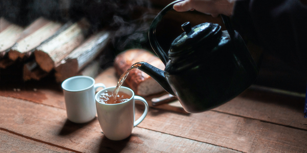 Pouring boiled water from a teapot