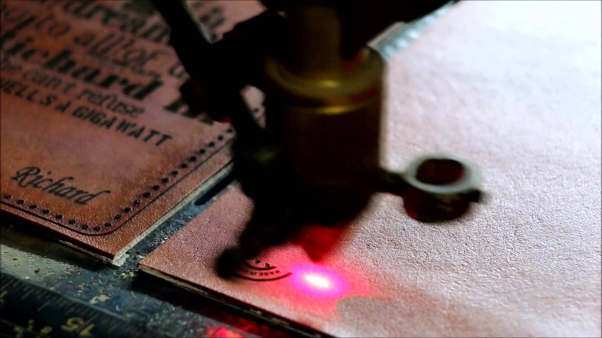 Laser engraving on dark brown leather