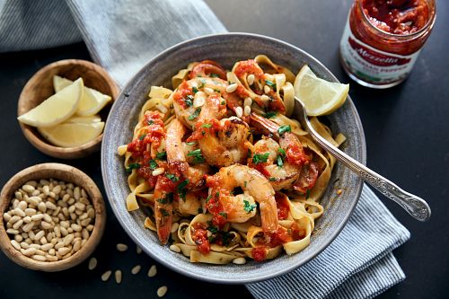 A bowl of shrimp pasta made with Calabrian Pepper Sauce