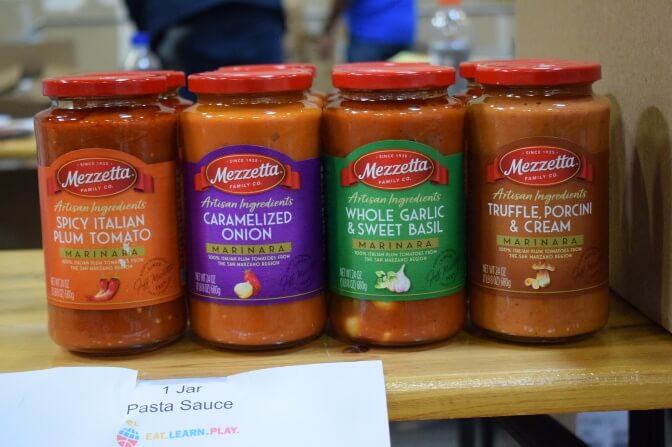 Four Mezzetta sauce jars