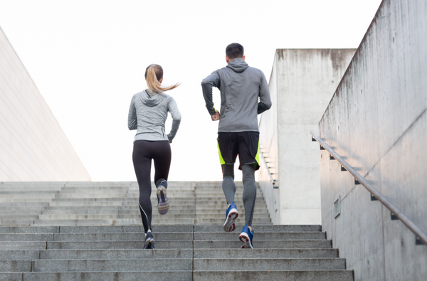 a man and a woman running 