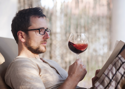 Man Looking at wine