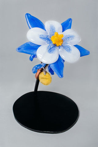 Blue and white glass flower with medallion 