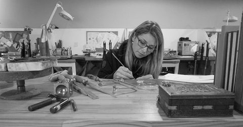 Black & White image of Linda MacDonald hard at work crafting her jewellery