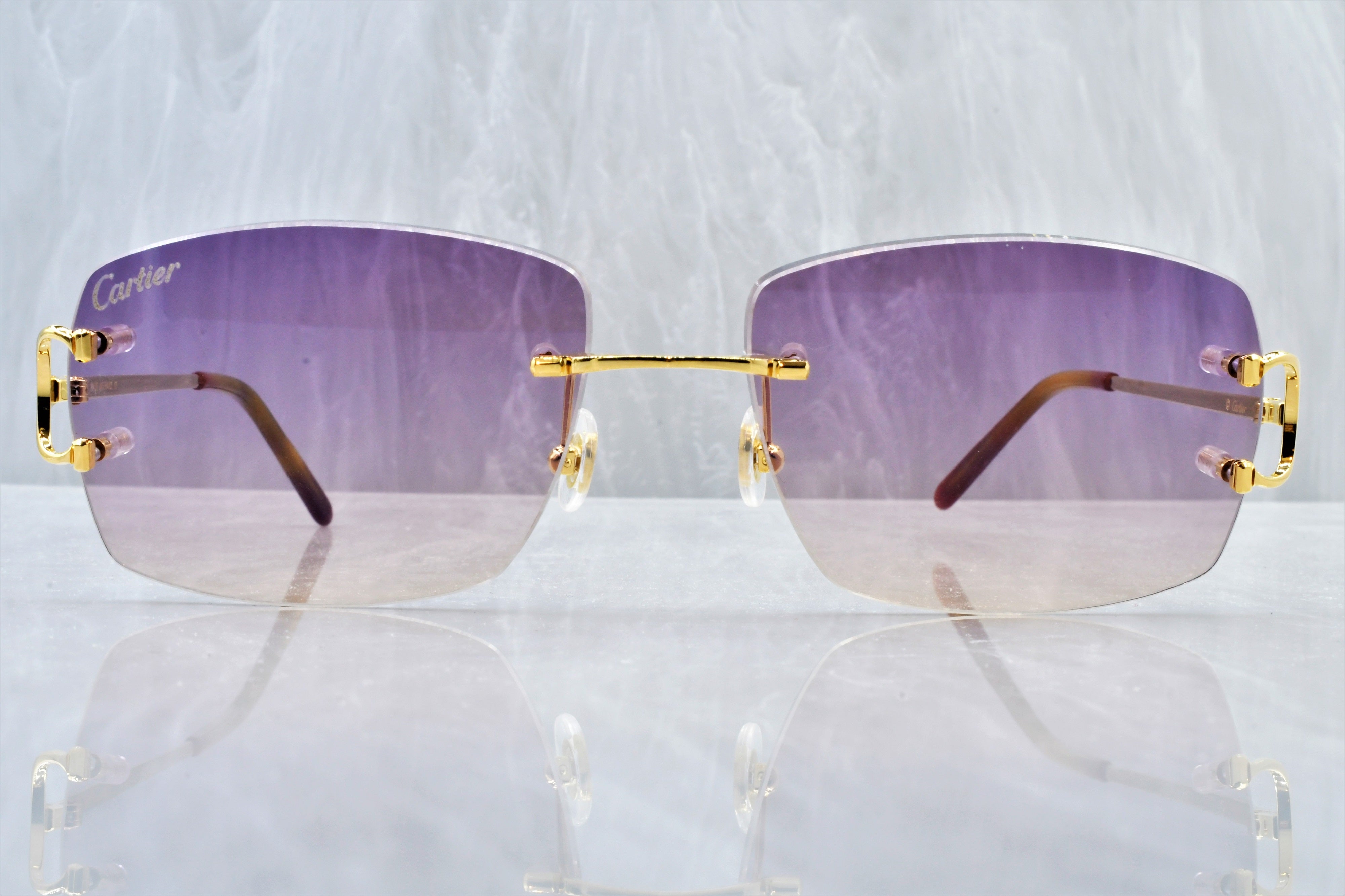 cartier purple tint