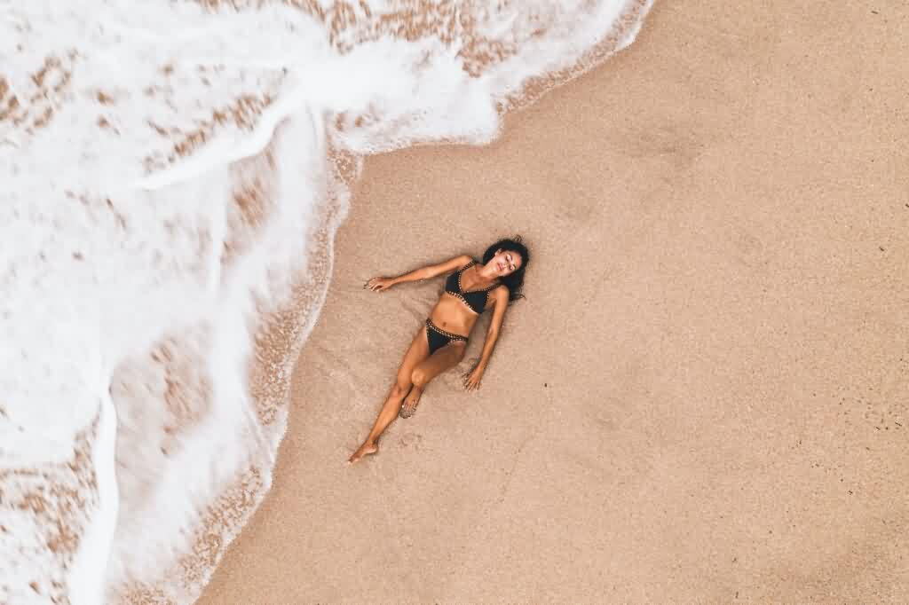 laser hair removal bikini woman on beach