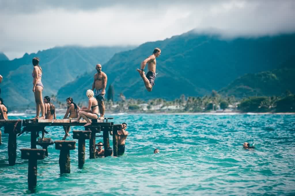 laser hair removal men and women jumping into the water