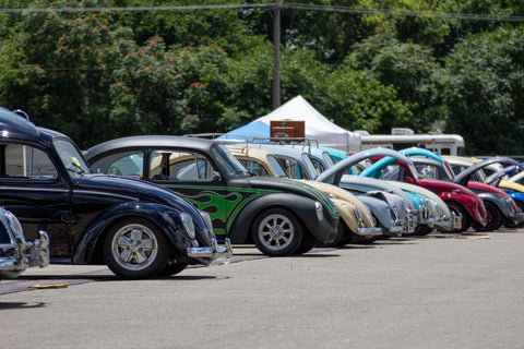Picture of car show lineup featuring VW Beetles