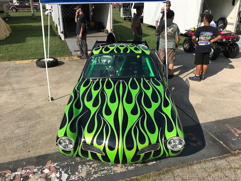 Picture of black Karmann Ghia race car with green flames