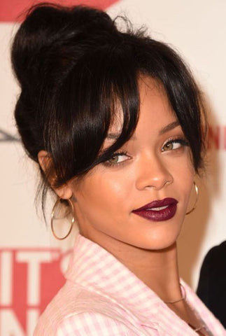 90s inspired updo hairstyle ideas hottest hair trends 2022 just right beauty rihanna with a 90s updo and curtain bangs