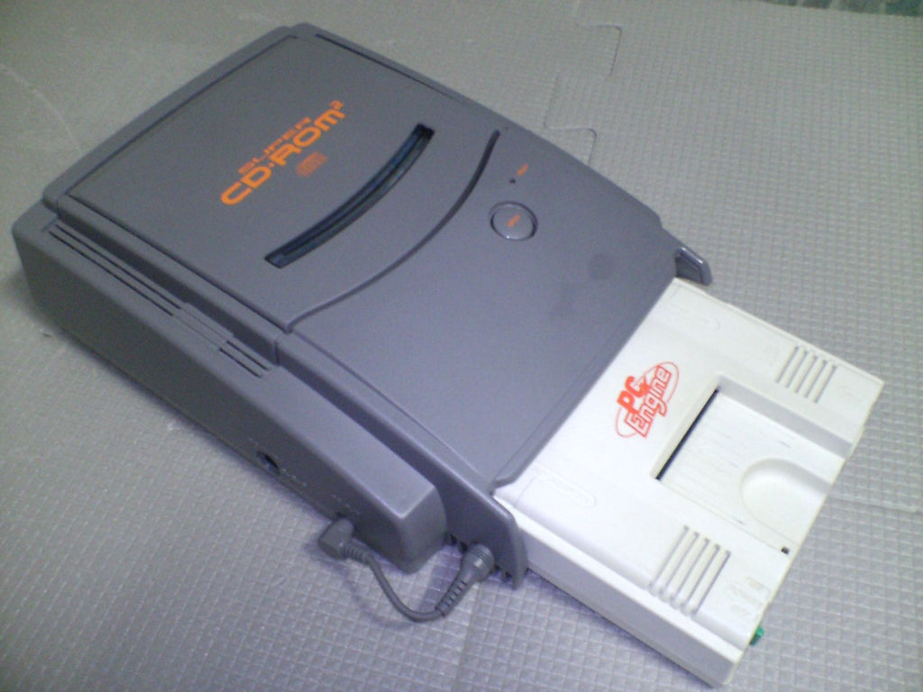 PCEngine_FirstModel_with_SuperCDRom2_1024x1024.jpg?v=1404499957