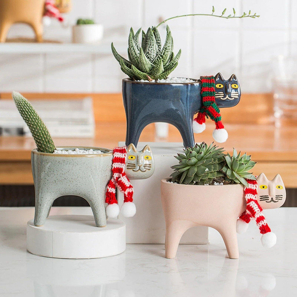 https://cdn.shopify.com/s/files/1/0561/1035/0533/products/ceramic-flower-pot-cute-cat-shape-garden_main-0_1.jpg?v=1670198525&width=1000