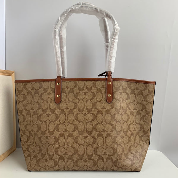 coach reversible pvc city signature tote