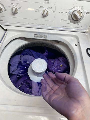 wash dyed clothing in washing machine after dying process