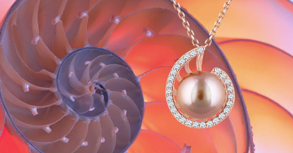 14K Rose Gold Nautilus Pendant with a 10mm Natural Pink Freshwater Pearl and 0.27 Carats (total weight) of Diamonds.