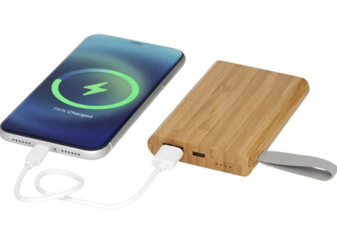 Phone being charged by a Bamboo power bank
