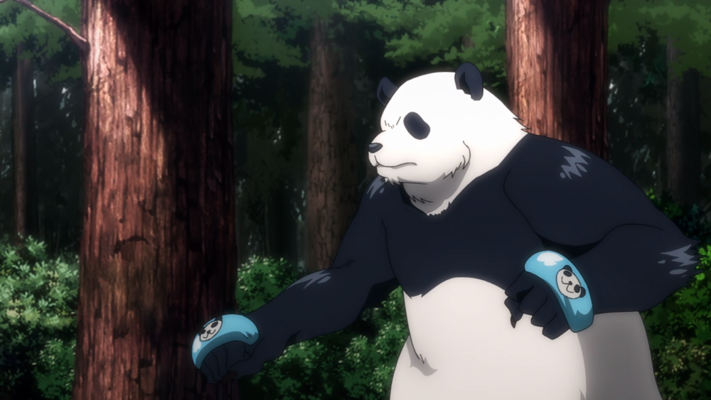 Au combat, Panda arbore des brassards d'articulation décorés de têtes de panda au centre.