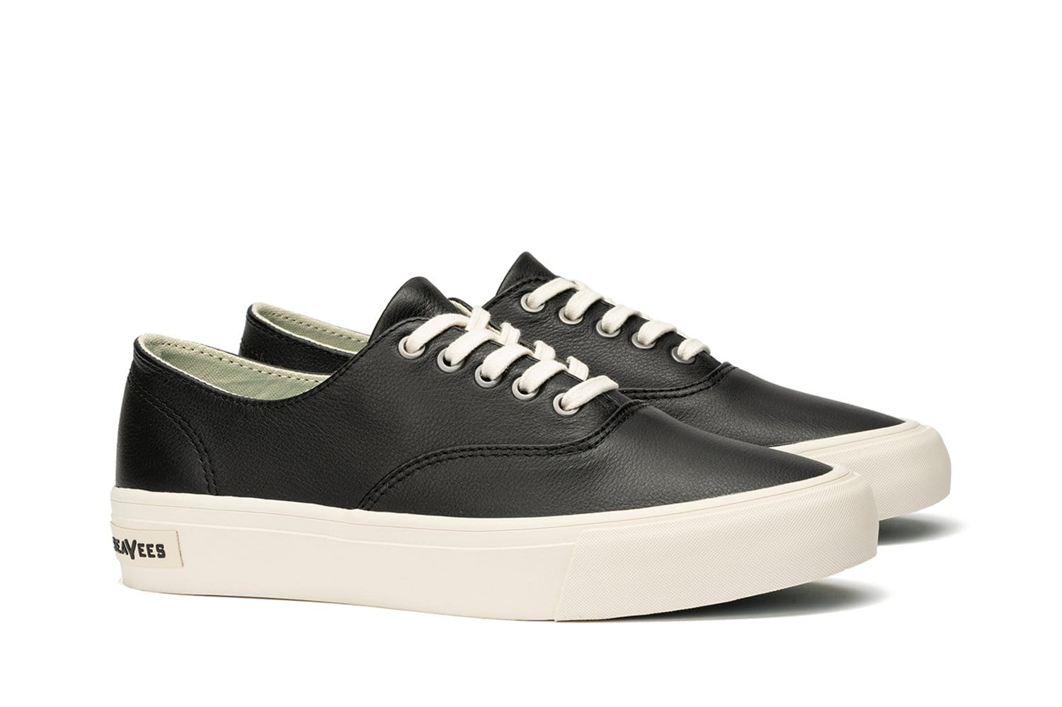 black leather plimsolls womens