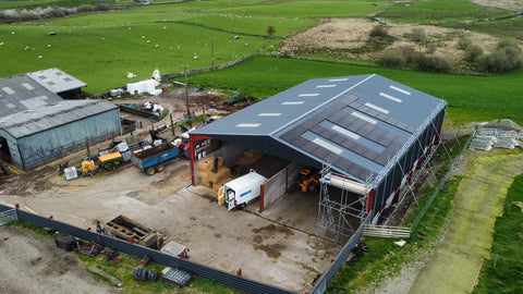 Farm building with solar pv electricity panels on roof