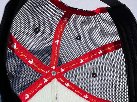 Red Tapped Seams inside a Trucker Hat