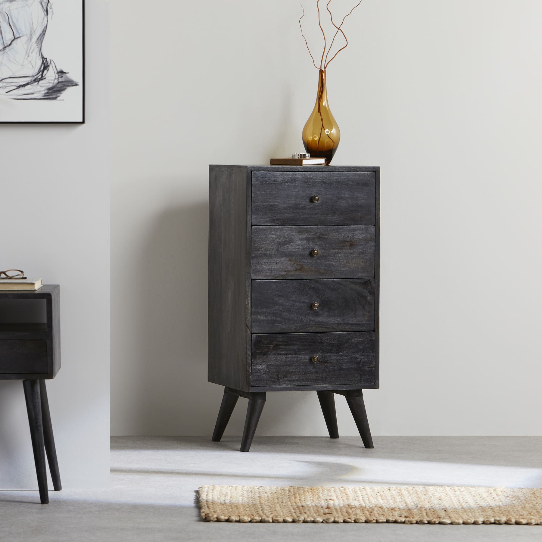 black tallboy and bedside tables