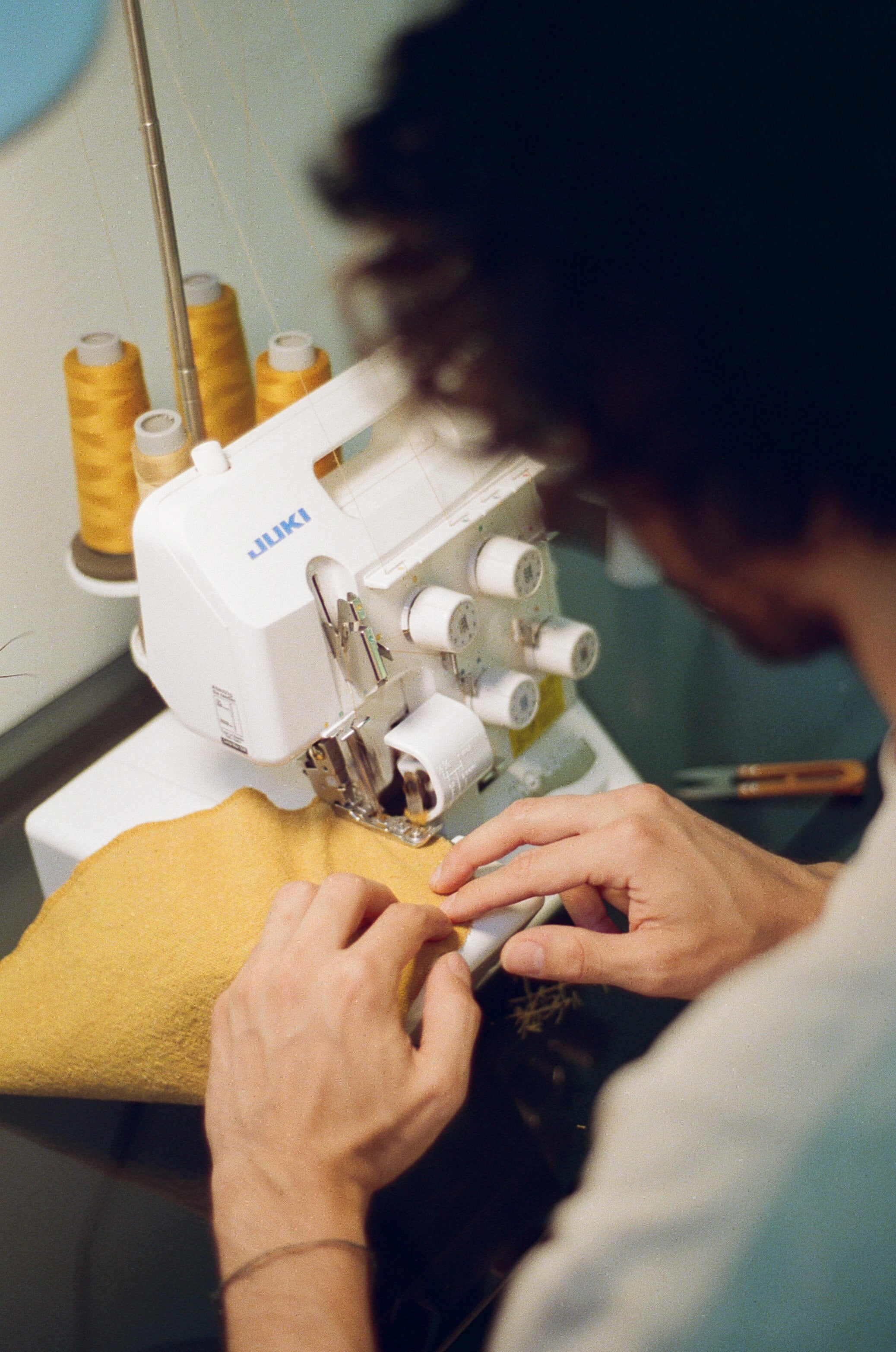 Alejandro sewing