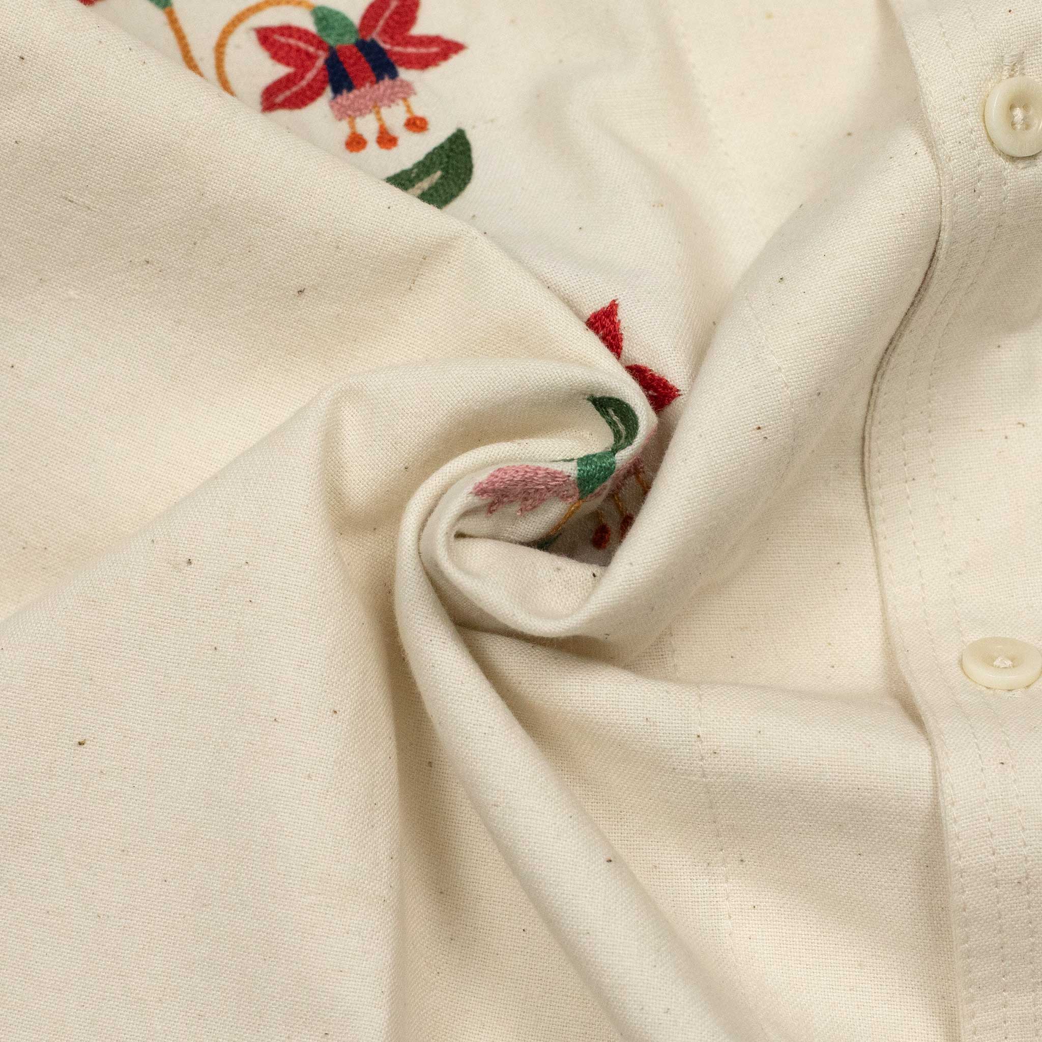 Chintan shirt in natural khadi with hand-embroidered floral motifs