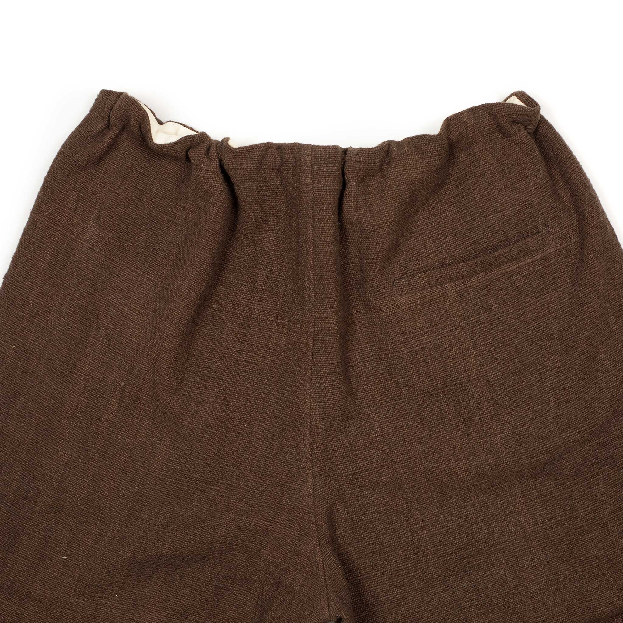 Drawstring tapered trousers in burnt umber cotton basketweave