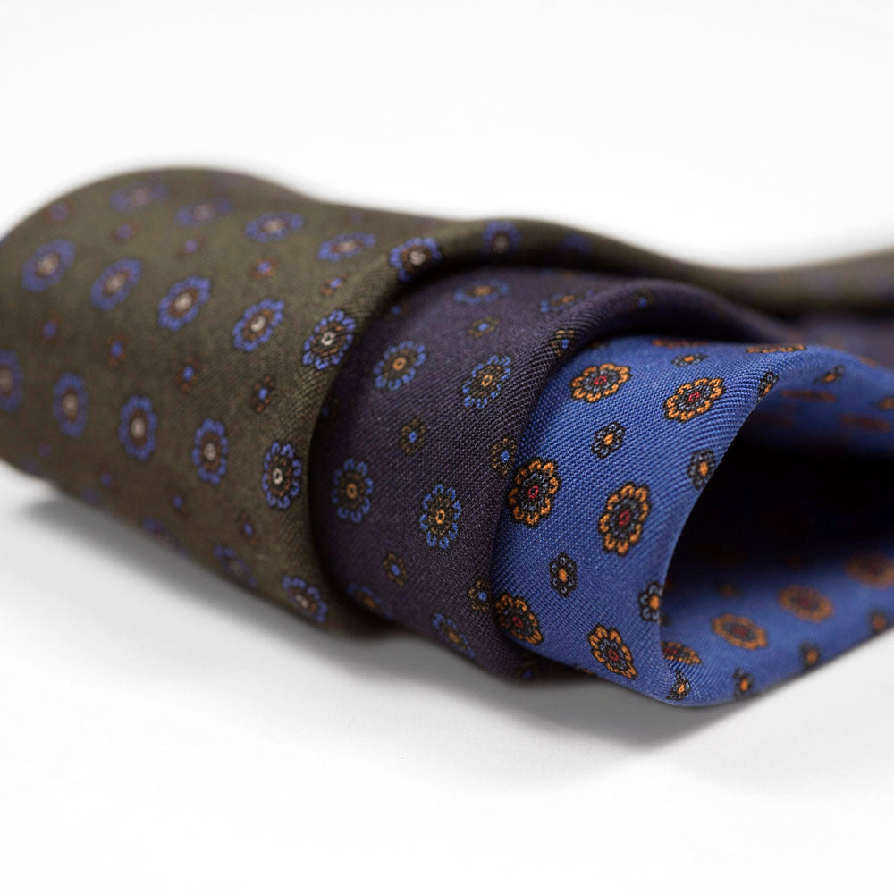 Green silk twill tie, blue & brown rosette neat print