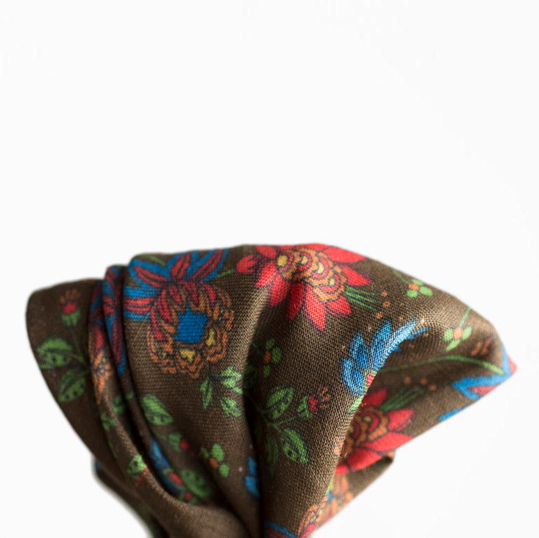 Brown linen square, red, light blue, and green flower print