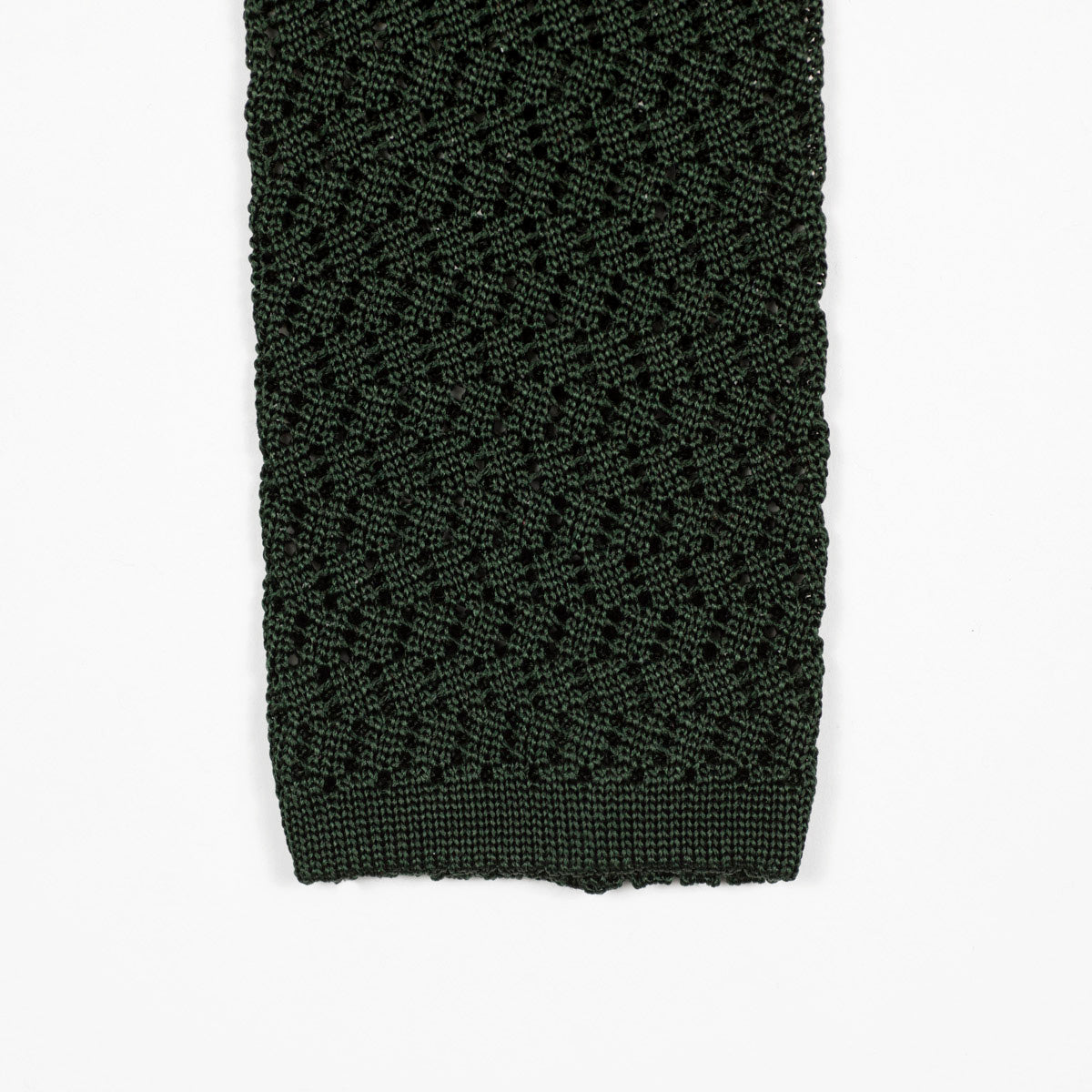 Green square bottom silk knit tie, zig-zag weave