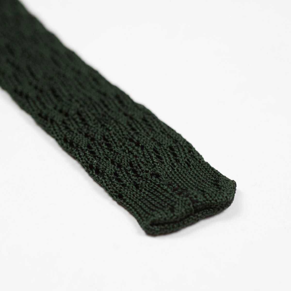 Green square bottom silk knit tie, zig-zag weave