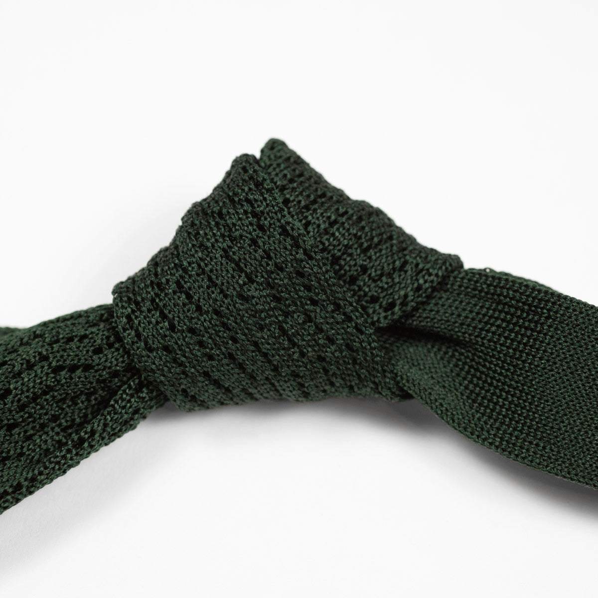 Green square bottom silk knit tie, zig-zag weave