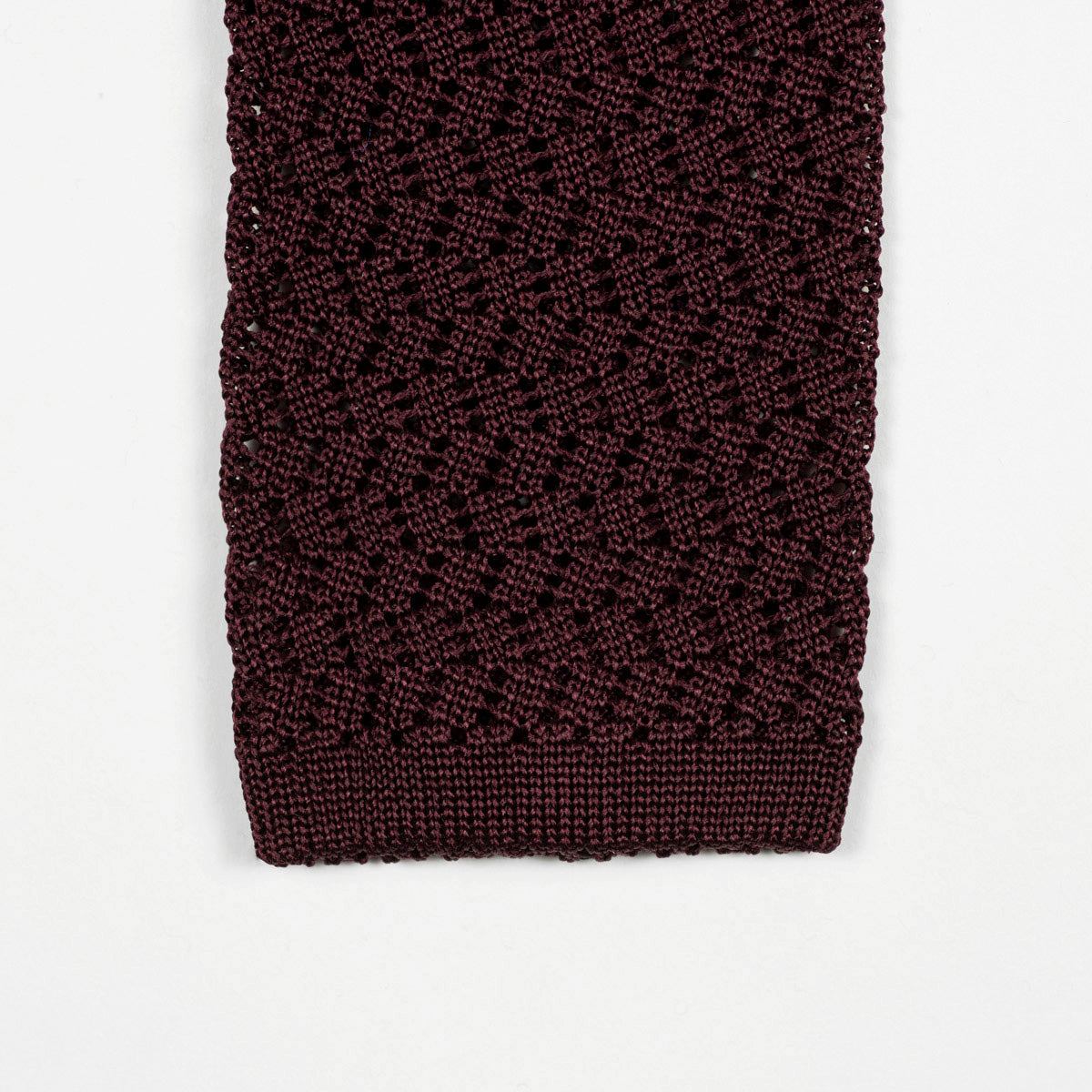 Burgundy square bottom silk knit tie, zig-zag weave