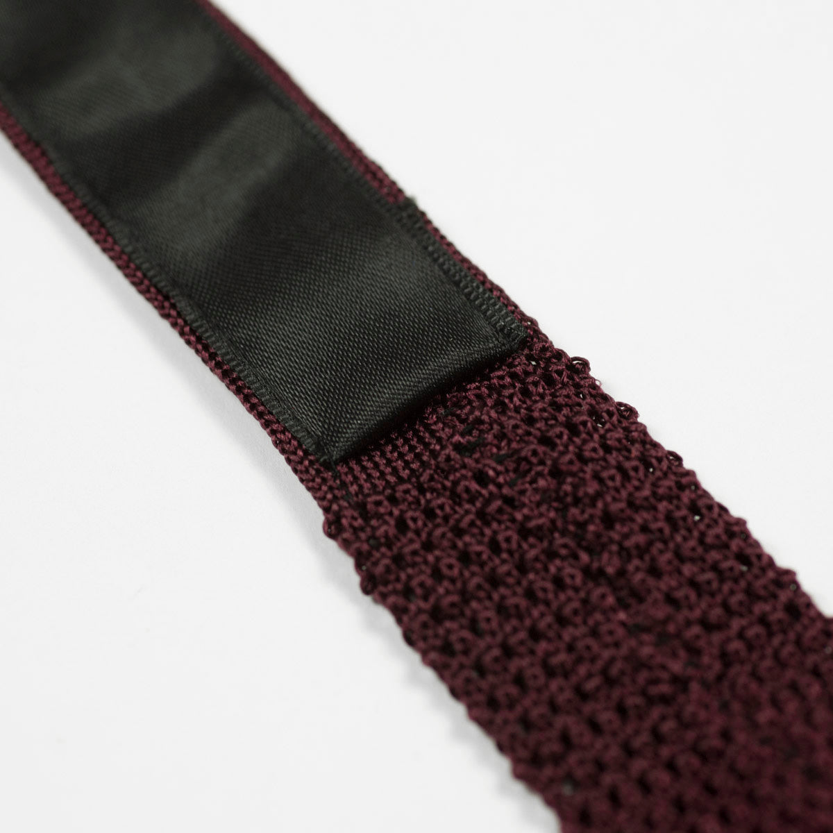 Burgundy square bottom silk knit tie, hand-sewn grey dots