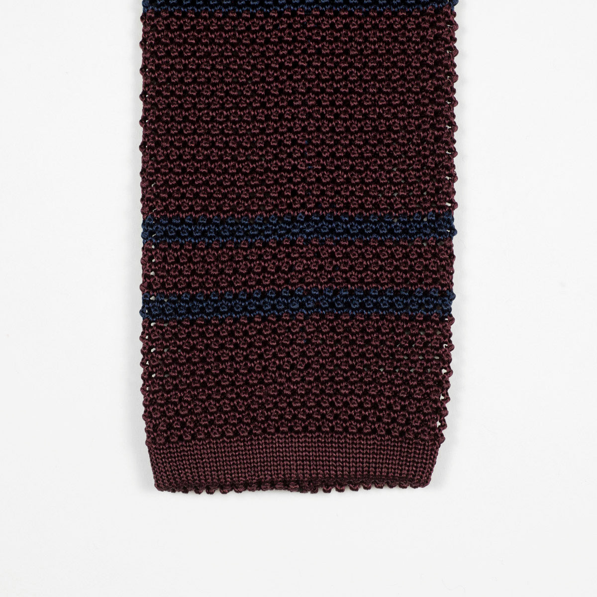 Burgundy square bottom silk knit tie, navy stripes