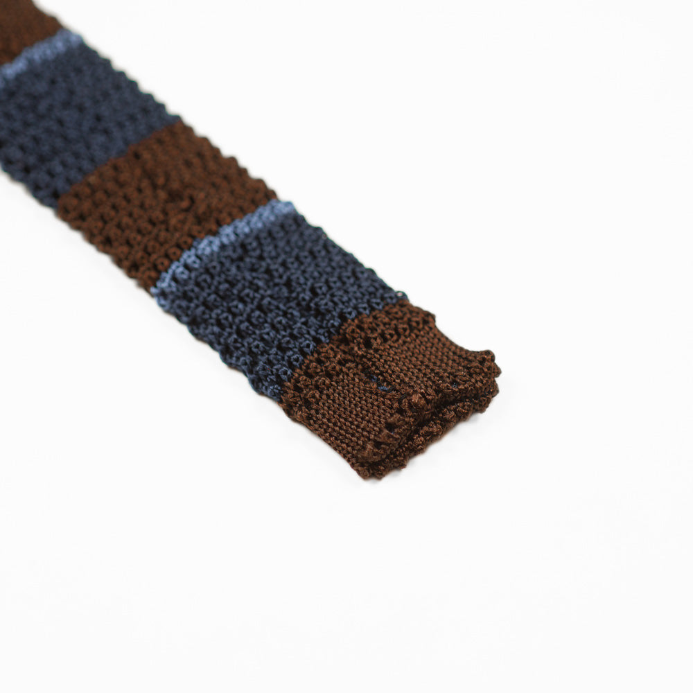 Brown and navy block stripe knit tie, blue stripes