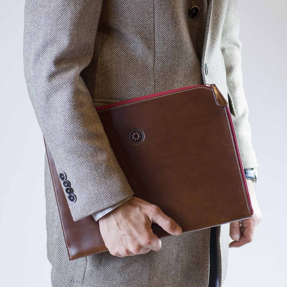 Brown leather portfolio with brown zipper