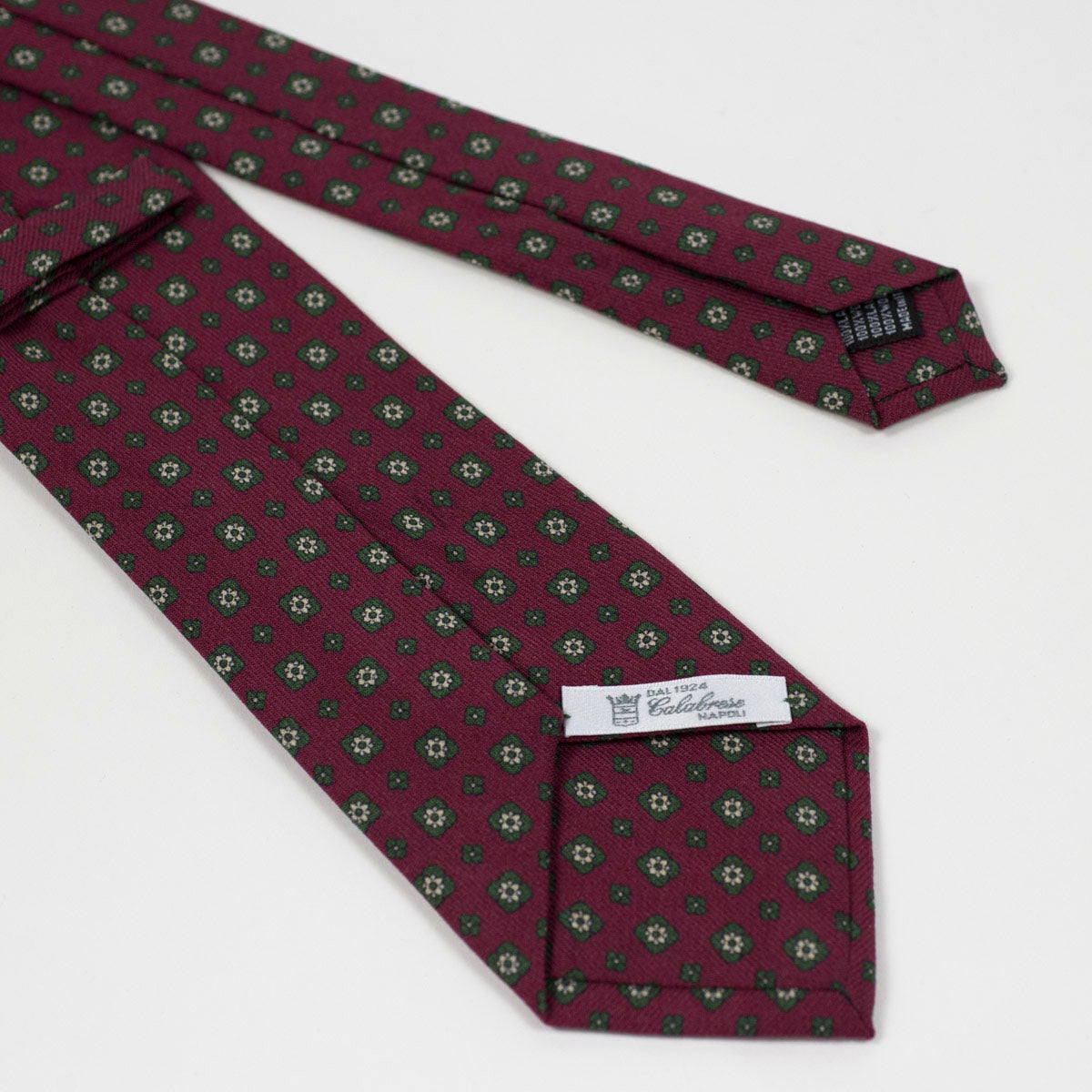 Burgundy self-tipped wool tie, green neat print