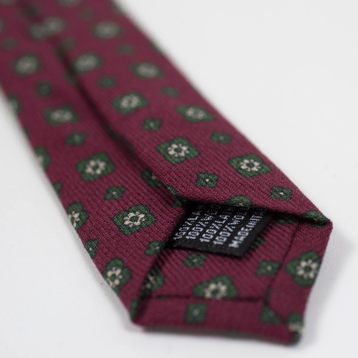 Burgundy self-tipped wool tie, green neat print