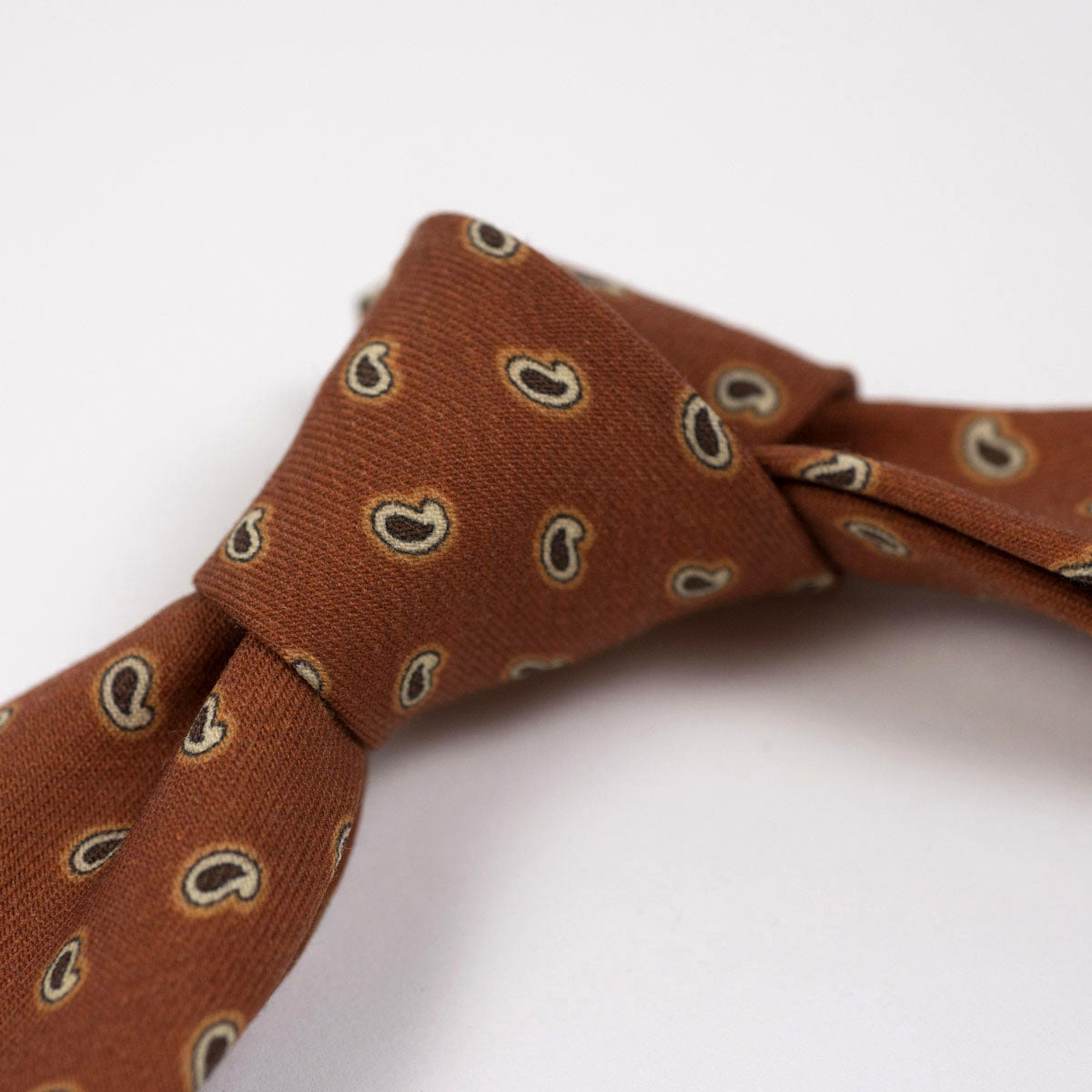 Burnt orange self-tipped wool tie, brown & cream paisley print