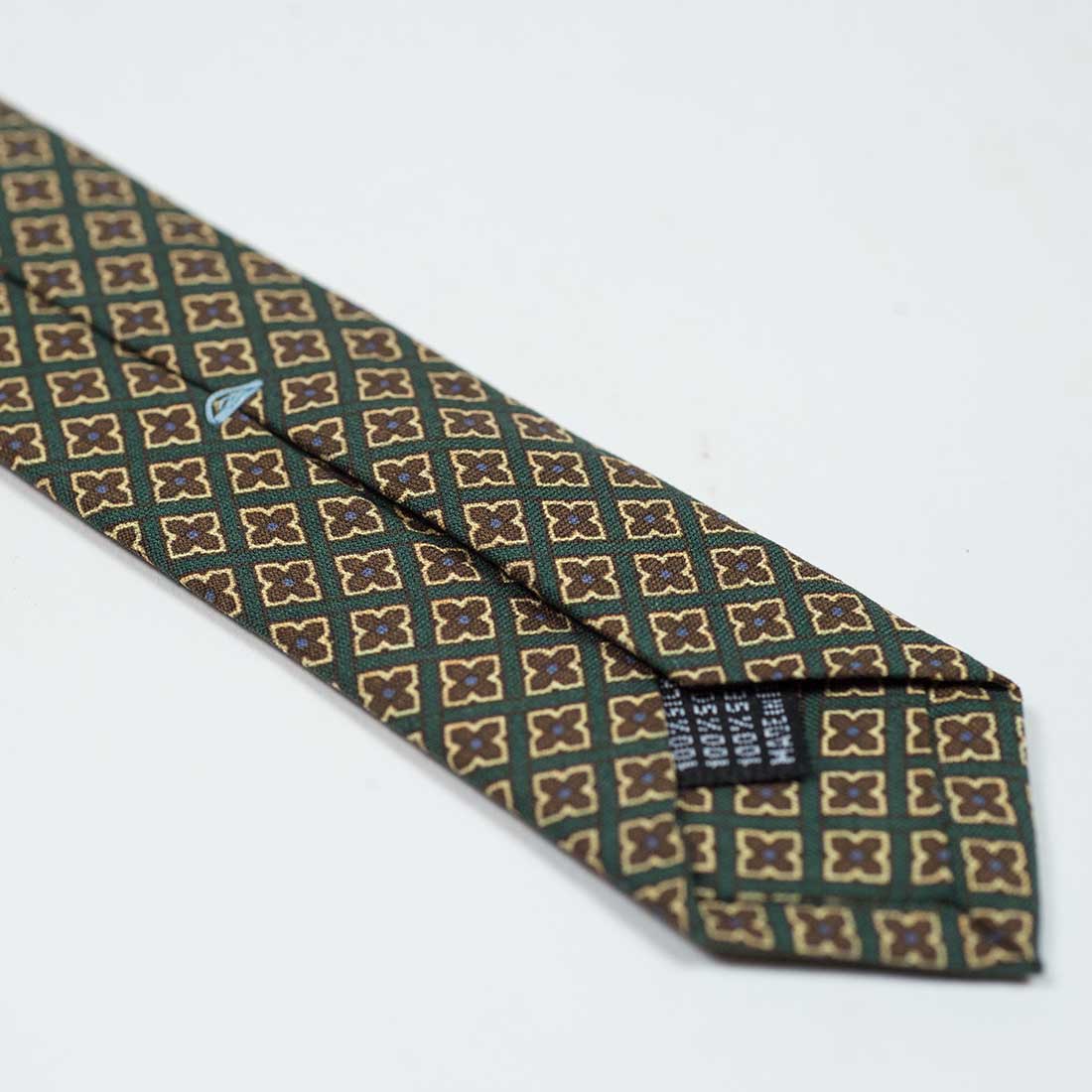 Dark green silk tie with brown neat print