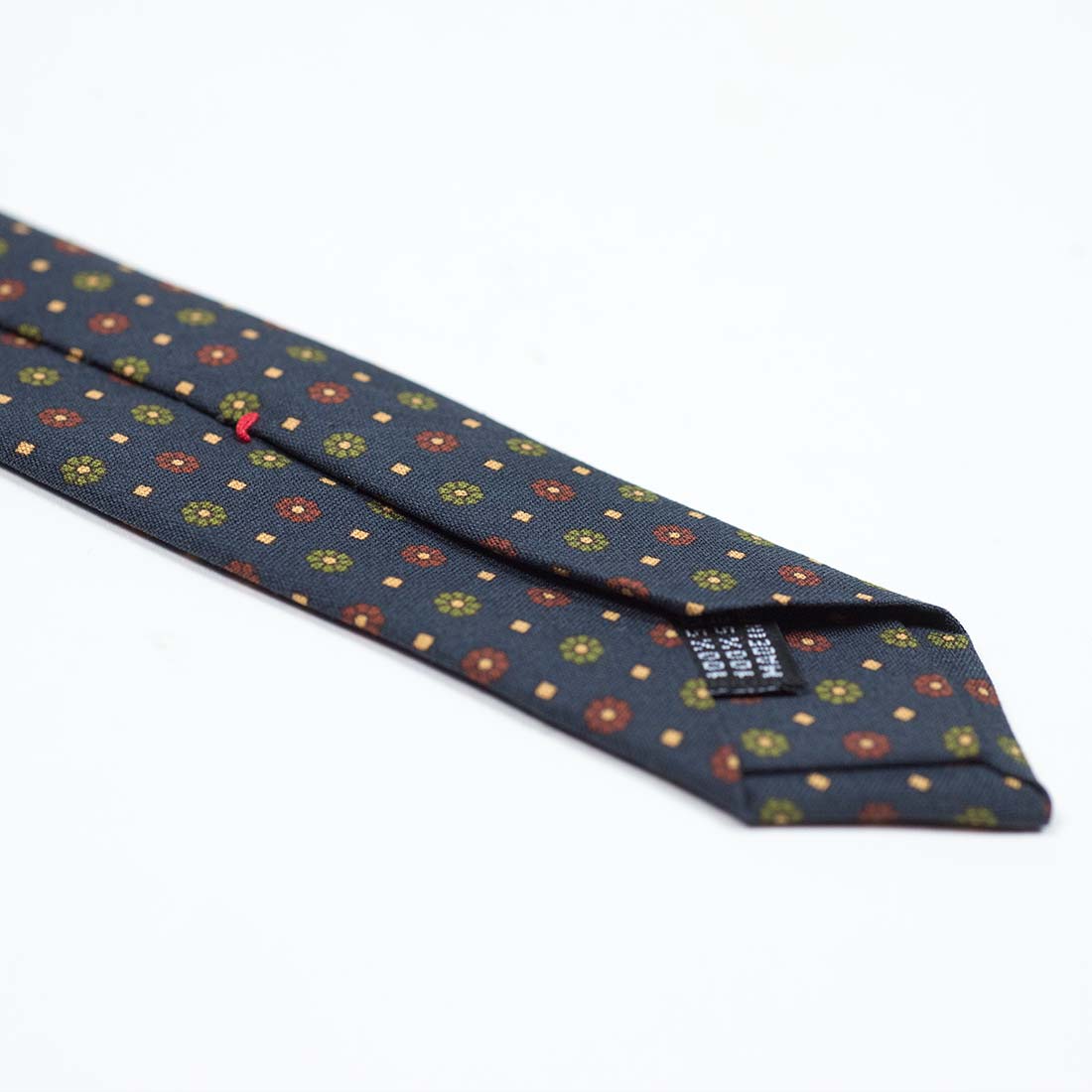 Denim blue silk tie with rust and green flower print