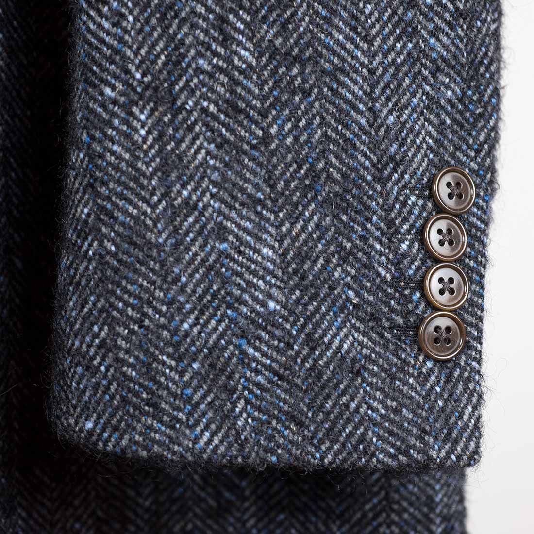 Blue herringbone mix peaked lapel overcoat